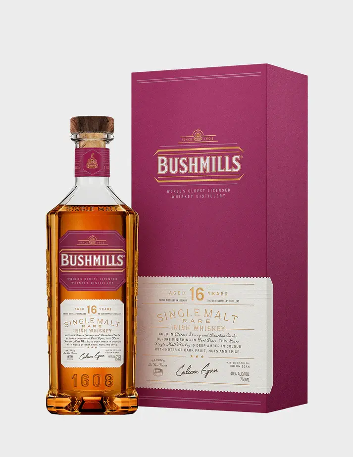 Bushmills 16 Year Old Single Malt Irish Whiskey bottle with pink label, aged in Oloroso sherry and bourbon casks finished in port pipes