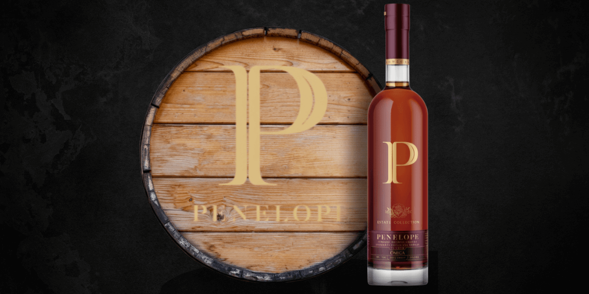 Penelope Estate Collection Omega bourbon bottle with gold logo barrel head, an 11-year limited release straight bourbon finished in French Oak barrels.